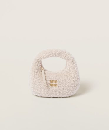 Wander shearling hobo bag with leather details