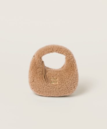 Wander shearling hobo bag with leather details